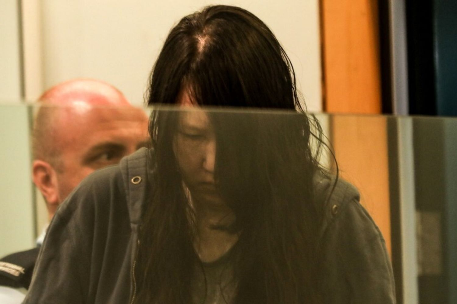 Hakyung Lee durante la sua condanna all'ergastolo per l'omicidio dei suoi due figli