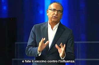 Carlo Conti nello spot della campagna antiinfluenzale del Ministero della Salute