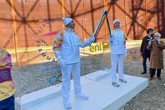 Torch Kiss: la fiamma olimpica al Gazometro
