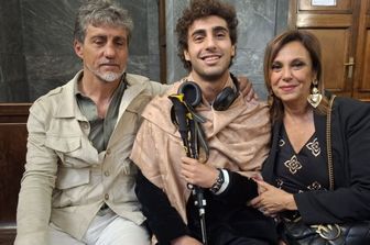 Davide Cavallo con i genitori in tribunale a Milano