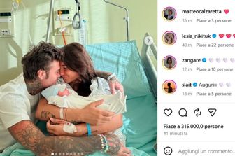 Fedez con la compagna Giulia Honegger e il piccolo Edoardo Lupo