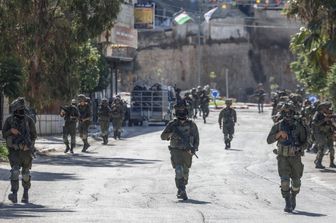 Militari nel villaggio di Qusra, in Cisgiordania