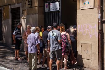Poveri alla mensa della Caritas